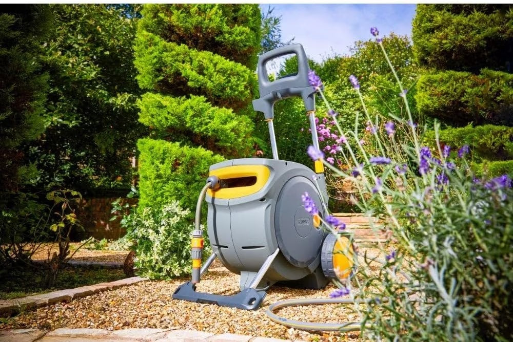 Ad - Just got my hands on the @hozelock Auto Reel Mobile and it's a game-changer! 🌿✨ This 35m hose is perfect for keeping my garden green and tidy. Its automatic controlled